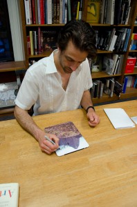 Arthur Phillips signing my ebook (iPad) Arthur Phillips at Politics and Prose, 5-24-2011