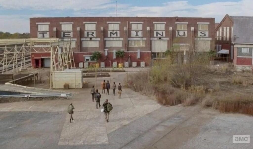 Terminus as the show dressed it, the survivors walking into the yard.