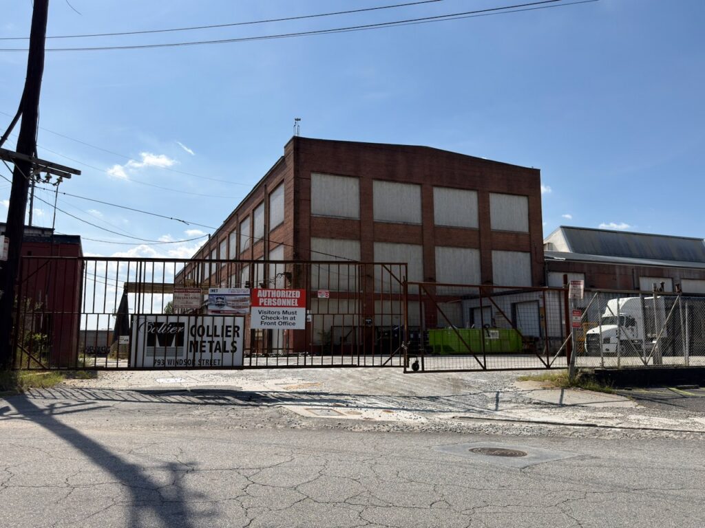 The Collier Metals gate on Windsor Street, the Terminus block behind it.
